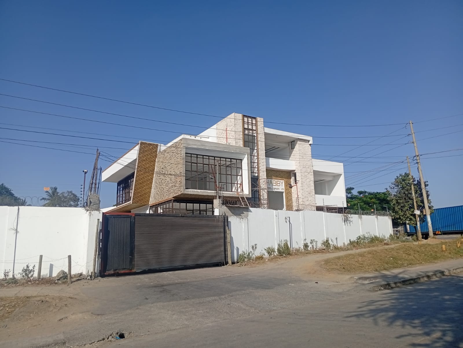 Modern office building design in Mombasa with coastal façade and glazing